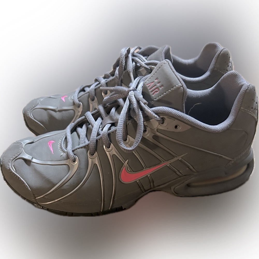 Gray and pink Nike women shoes with 2 small parts that break away on top reposh
